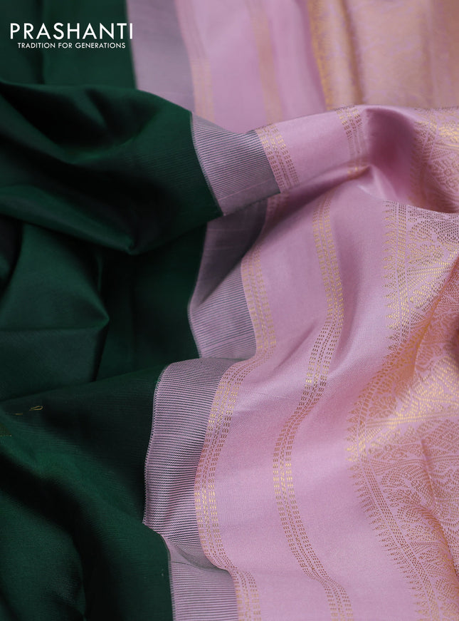Pure kanchipuram silk saree bottle green and pastel pink with zari woven buttas and long rich zari wover korvai border