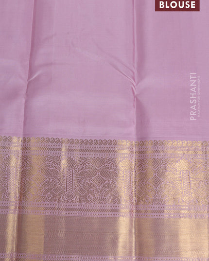 Pure kanchipuram silk saree bottle green and pastel pink with zari woven buttas and long rich zari wover korvai border