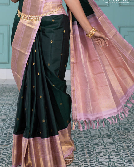 Pure kanchipuram silk saree bottle green and pastel pink with zari woven buttas and long rich zari wover korvai border