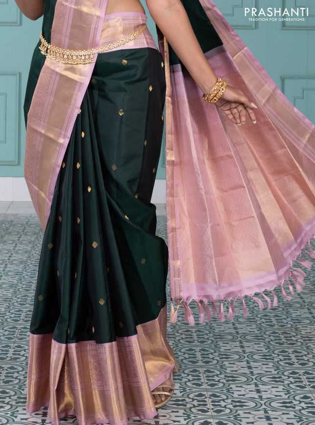 Pure kanchipuram silk saree bottle green and pastel pink with zari woven buttas and long rich zari wover korvai border