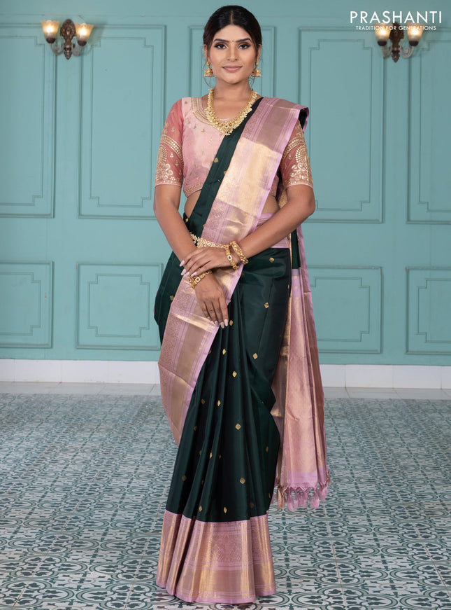 Pure kanchipuram silk saree bottle green and pastel pink with zari woven buttas and long rich zari wover korvai border
