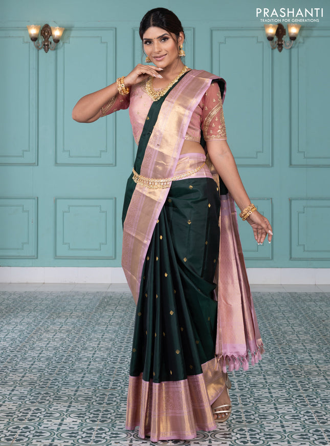 Pure kanchipuram silk saree bottle green and pastel pink with zari woven buttas and long rich zari wover korvai border