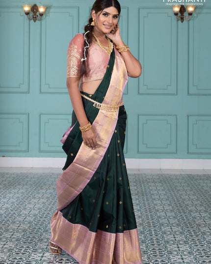 Pure kanchipuram silk saree bottle green and pastel pink with zari woven buttas and long rich zari wover korvai border