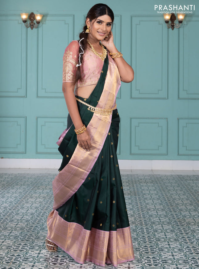 Pure kanchipuram silk saree bottle green and pastel pink with zari woven buttas and long rich zari wover korvai border