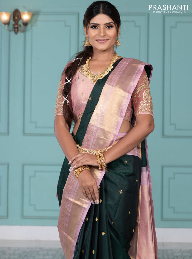 Pure kanchipuram silk saree bottle green and pastel pink with zari woven buttas and long rich zari wover korvai border