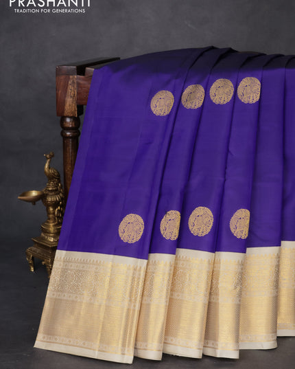 Pure kanchipuram silk saree blue and cream with elephnant zari woven buttas and rich zari woven korvai border