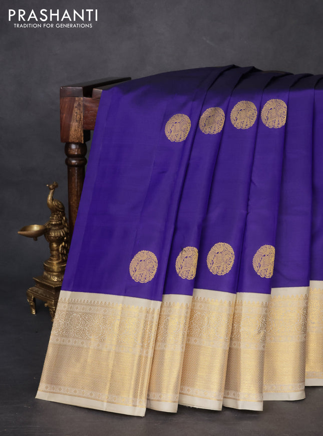 Pure kanchipuram silk saree blue and cream with elephnant zari woven buttas and rich zari woven korvai border