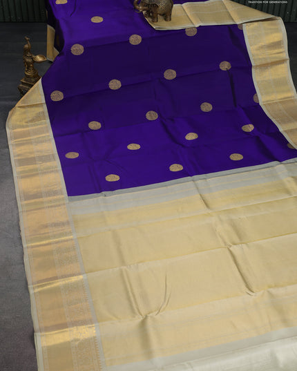 Pure kanchipuram silk saree blue and cream with elephnant zari woven buttas and rich zari woven korvai border