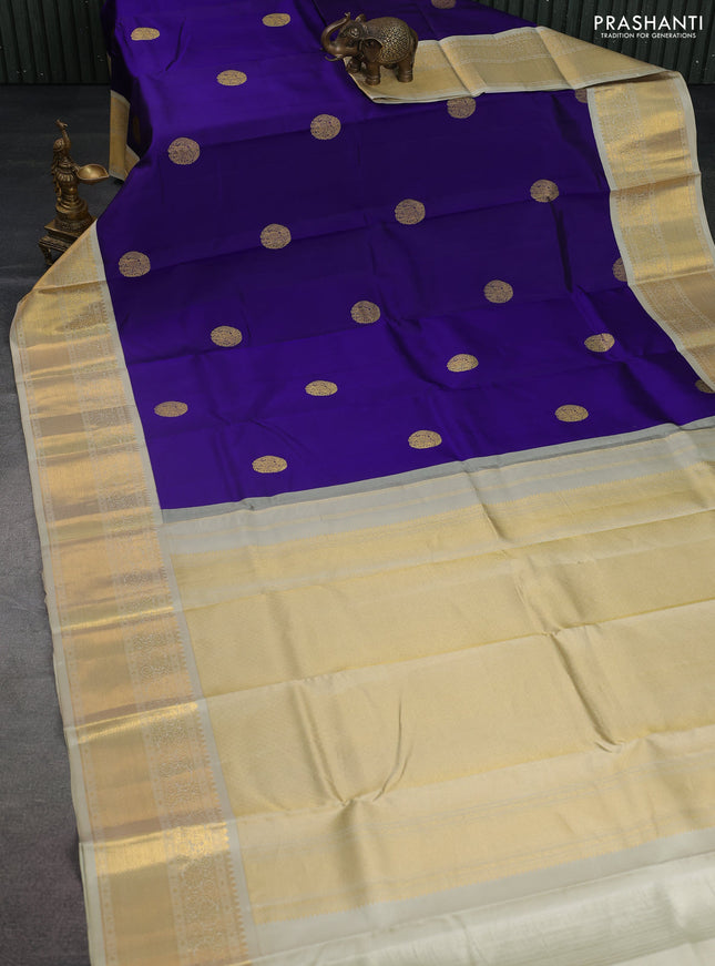 Pure kanchipuram silk saree blue and cream with elephnant zari woven buttas and rich zari woven korvai border