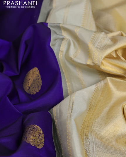 Pure kanchipuram silk saree blue and cream with elephnant zari woven buttas and rich zari woven korvai border