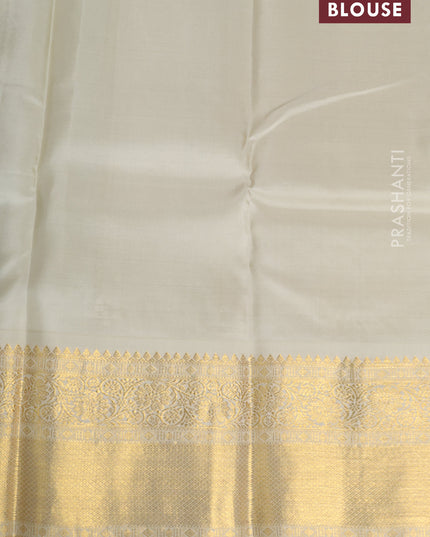 Pure kanchipuram silk saree blue and cream with elephnant zari woven buttas and rich zari woven korvai border