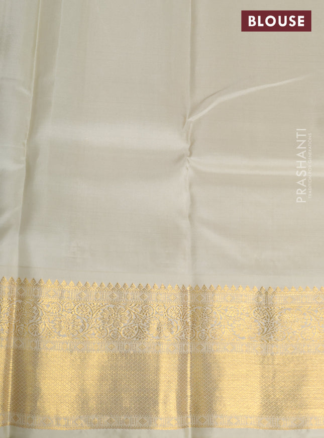 Pure kanchipuram silk saree blue and cream with elephnant zari woven buttas and rich zari woven korvai border