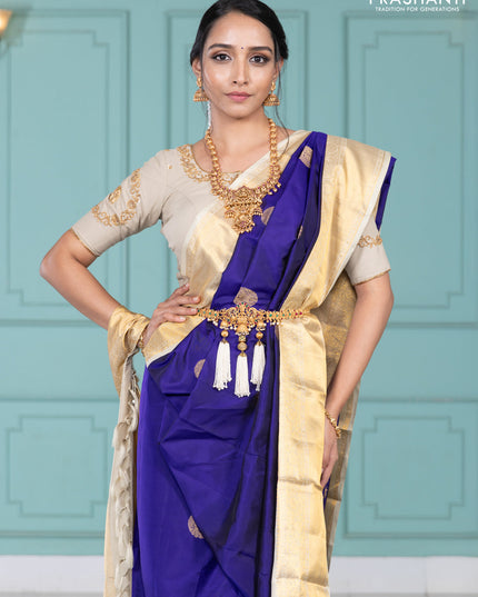 Pure kanchipuram silk saree blue and cream with elephnant zari woven buttas and rich zari woven korvai border