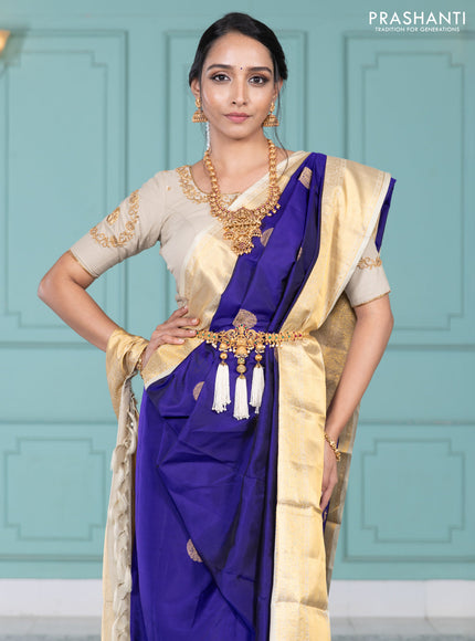 Pure kanchipuram silk saree blue and cream with elephnant zari woven buttas and rich zari woven korvai border