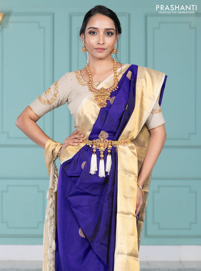 Pure kanchipuram silk saree blue and cream with elephnant zari woven buttas and rich zari woven korvai border