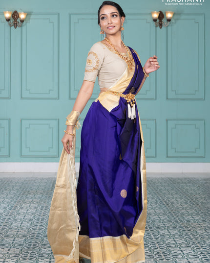 Pure kanchipuram silk saree blue and cream with elephnant zari woven buttas and rich zari woven korvai border