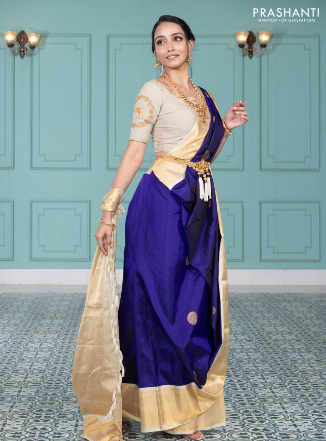 Pure kanchipuram silk saree blue and cream with elephnant zari woven buttas and rich zari woven korvai border