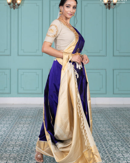 Pure kanchipuram silk saree blue and cream with elephnant zari woven buttas and rich zari woven korvai border