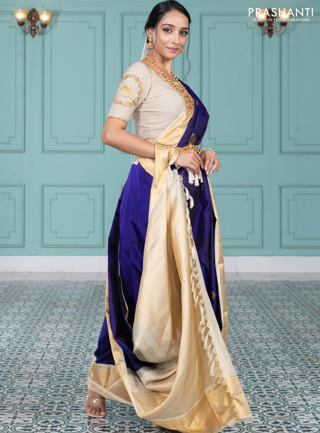Pure kanchipuram silk saree blue and cream with elephnant zari woven buttas and rich zari woven korvai border