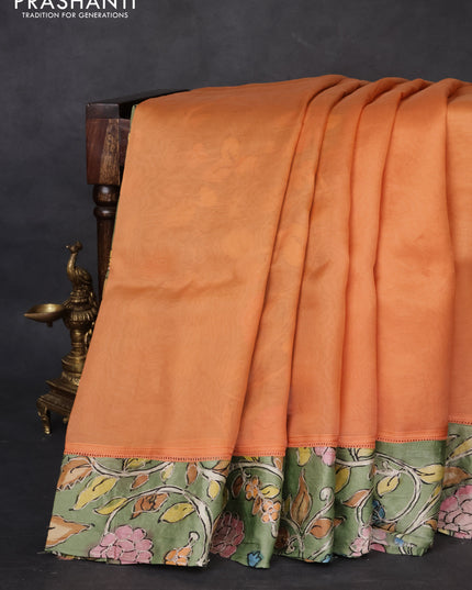Pure organza silk saree orange and pastel green with plain body and kalamkari printed pita work border