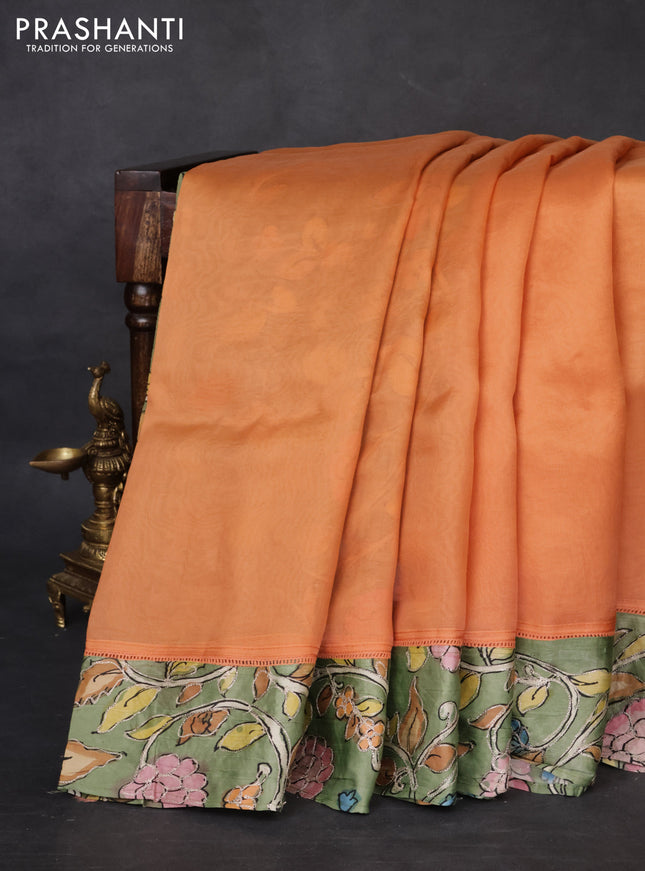 Pure organza silk saree orange and pastel green with plain body and kalamkari printed pita work border