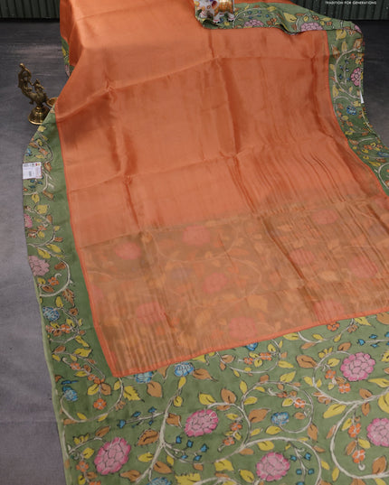 Pure organza silk saree orange and pastel green with plain body and kalamkari printed pita work border