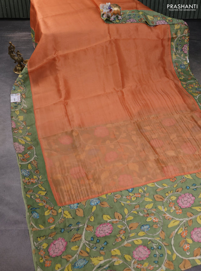 Pure organza silk saree orange and pastel green with plain body and kalamkari printed pita work border