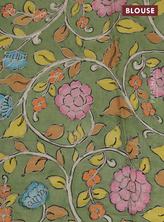 Pure organza silk saree orange and pastel green with plain body and kalamkari printed pita work border