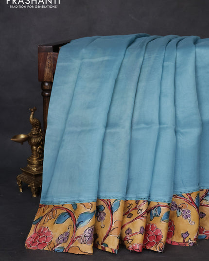 Pure organza silk saree pastel blue and sandal with plain body and kalamkari printed pita work border