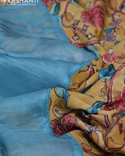 Pure organza silk saree pastel blue and sandal with plain body and kalamkari printed pita work border