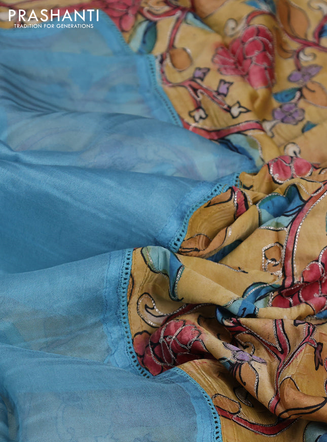 Pure organza silk saree pastel blue and sandal with plain body and kalamkari printed pita work border