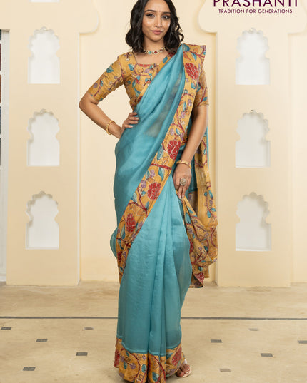 Pure organza silk saree pastel blue and sandal with plain body and kalamkari printed pita work border