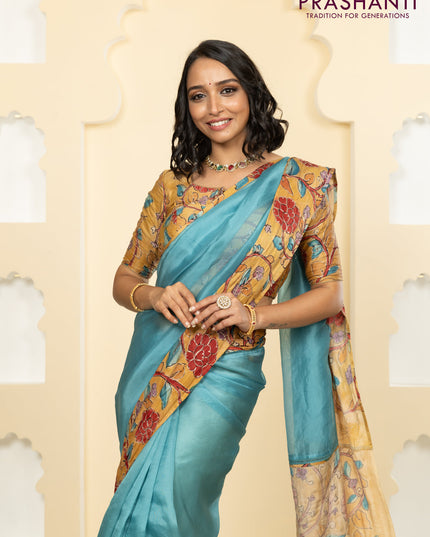 Pure organza silk saree pastel blue and sandal with plain body and kalamkari printed pita work border