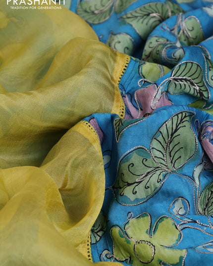 Pure organza silk saree yellow and cs blue with plain body and kalamkari printed pita work border