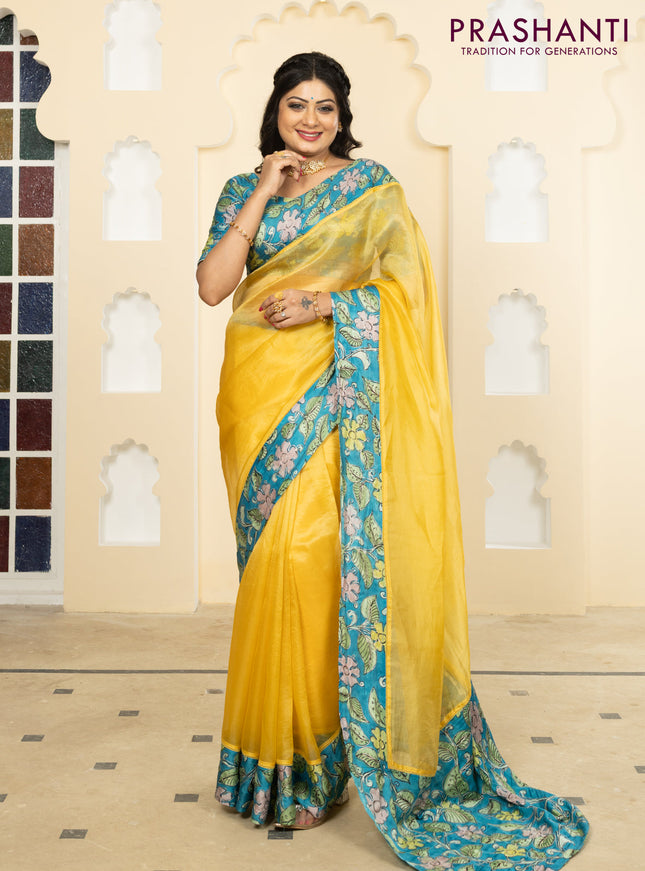 Pure organza silk saree yellow and cs blue with plain body and kalamkari printed pita work border