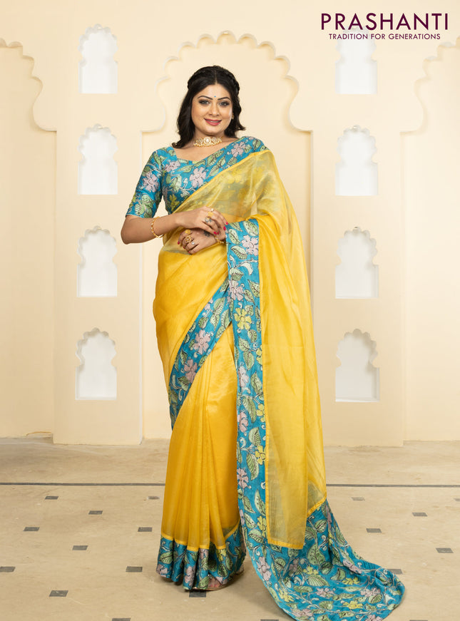 Pure organza silk saree yellow and cs blue with plain body and kalamkari printed pita work border