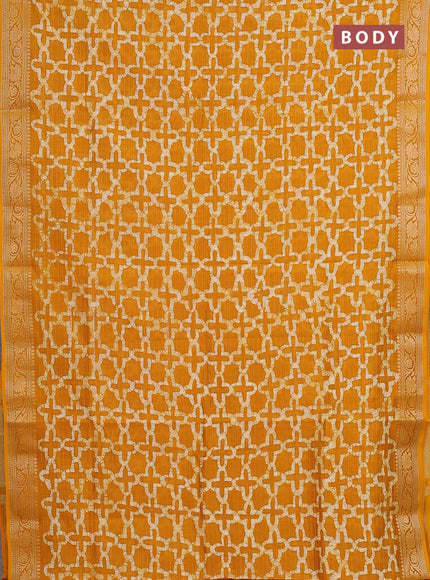 Maheshwari silk cotton saree mustard yellow with allover batik prints and zari woven border
