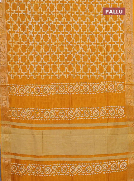 Maheshwari silk cotton saree mustard yellow with allover batik prints and zari woven border