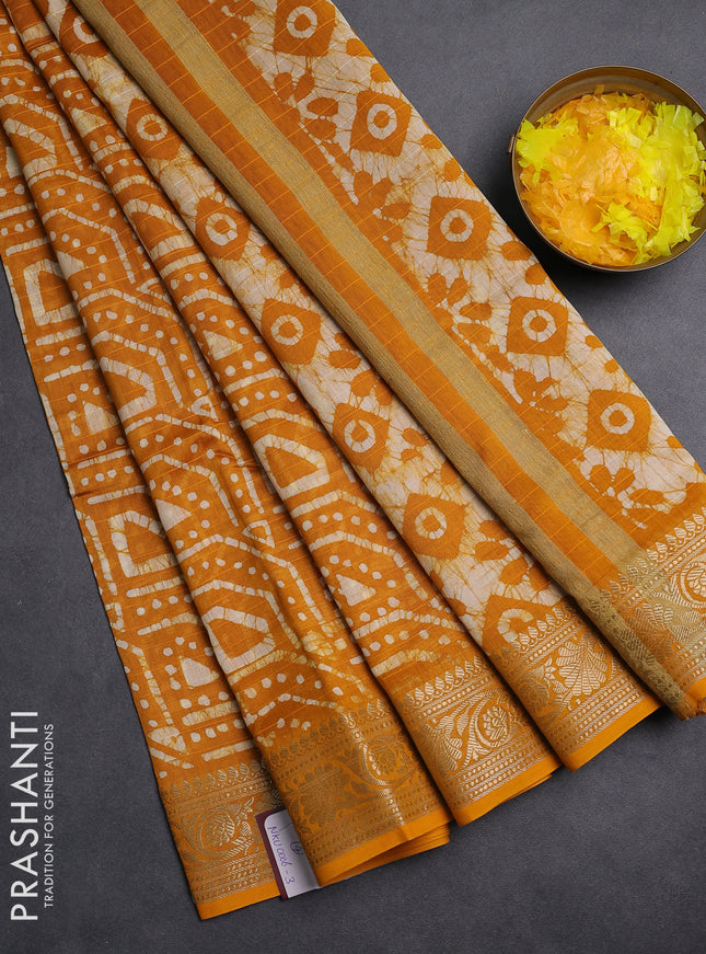 Maheshwari silk cotton saree mustard yellow with allover batik prints and zari woven border