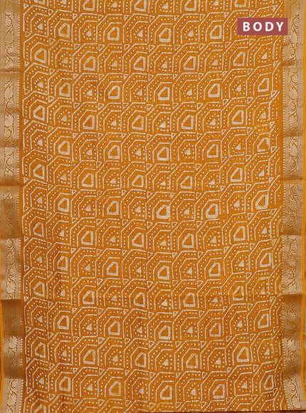 Maheshwari silk cotton saree mustard yellow with allover batik prints and zari woven border