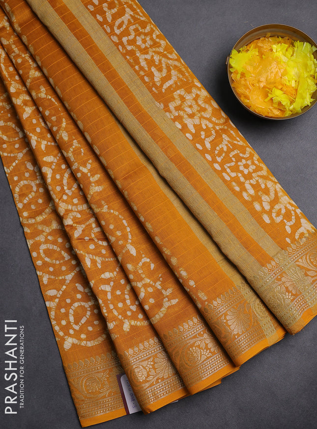 Maheshwari silk cotton saree mustard yellow with allover batik prints and zari woven border