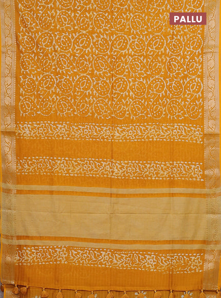 Maheshwari silk cotton saree mustard yellow with allover batik prints and zari woven border