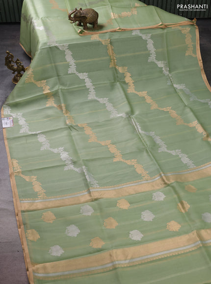 Banarasi organza silk saree pastel green with silver & gold zari weaves and zari woven piping boder