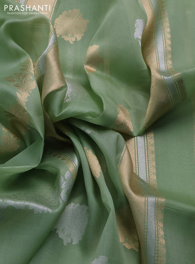 Banarasi organza silk saree pastel green with silver & gold zari weaves and zari woven piping boder