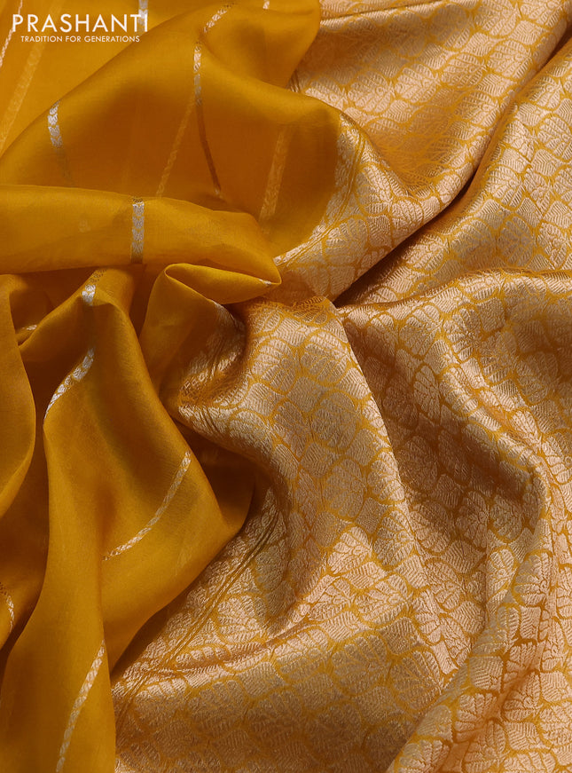 Banarasi organza silk saree mustard yellow with allover zari weaves and satin border