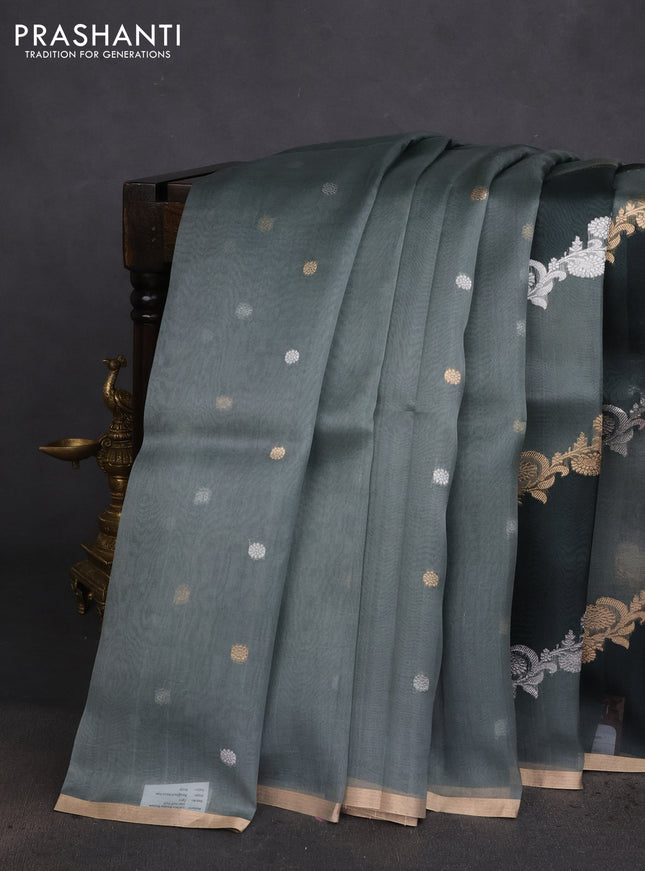 Banarasi organza silk saree greyish green with silver & gold zari weaves and zari woven piping boder