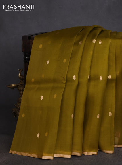 Banarasi organza silk saree mehendi green with zari woven buttas and zari woven piping boder