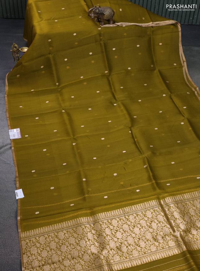 Banarasi organza silk saree mehendi green with zari woven buttas and zari woven piping boder