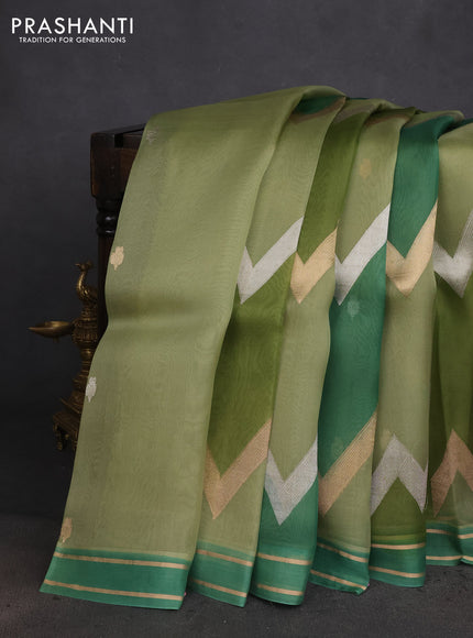 Banarasi organza silk saree pastel green and green with rangakt weaves and zari woven simple border
