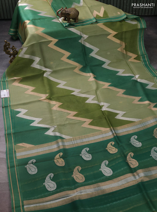Banarasi organza silk saree pastel green and green with rangakt weaves and zari woven simple border